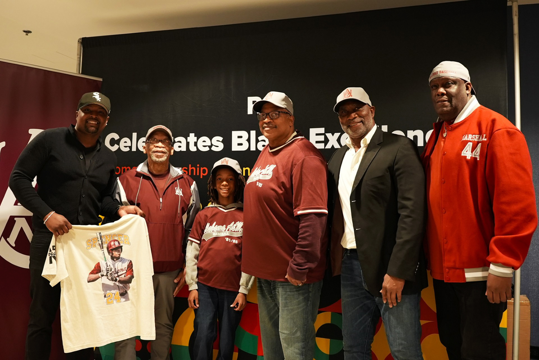 Former Bulldogs Gladstone Trotter second from left, with Jeremiah and his grandfather and two other former players