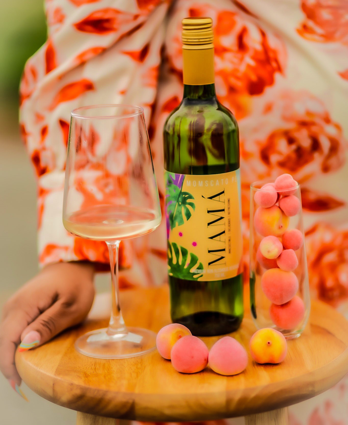 Dr. Ashely Hunt-Poole's MAMÁ Momscato Peach wine