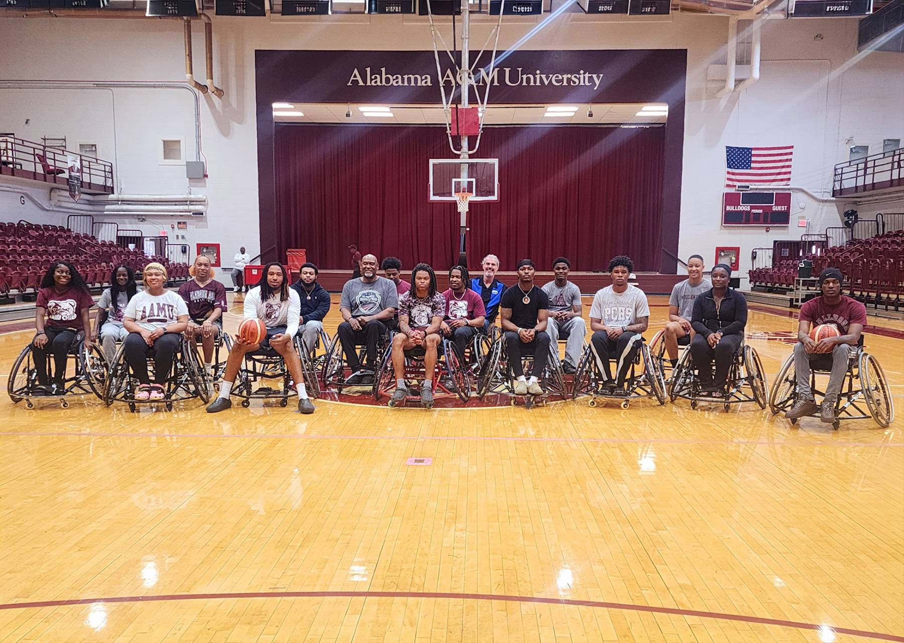 Brooks and Kyle join students on the Elmore Gym court after adaptive sports experience