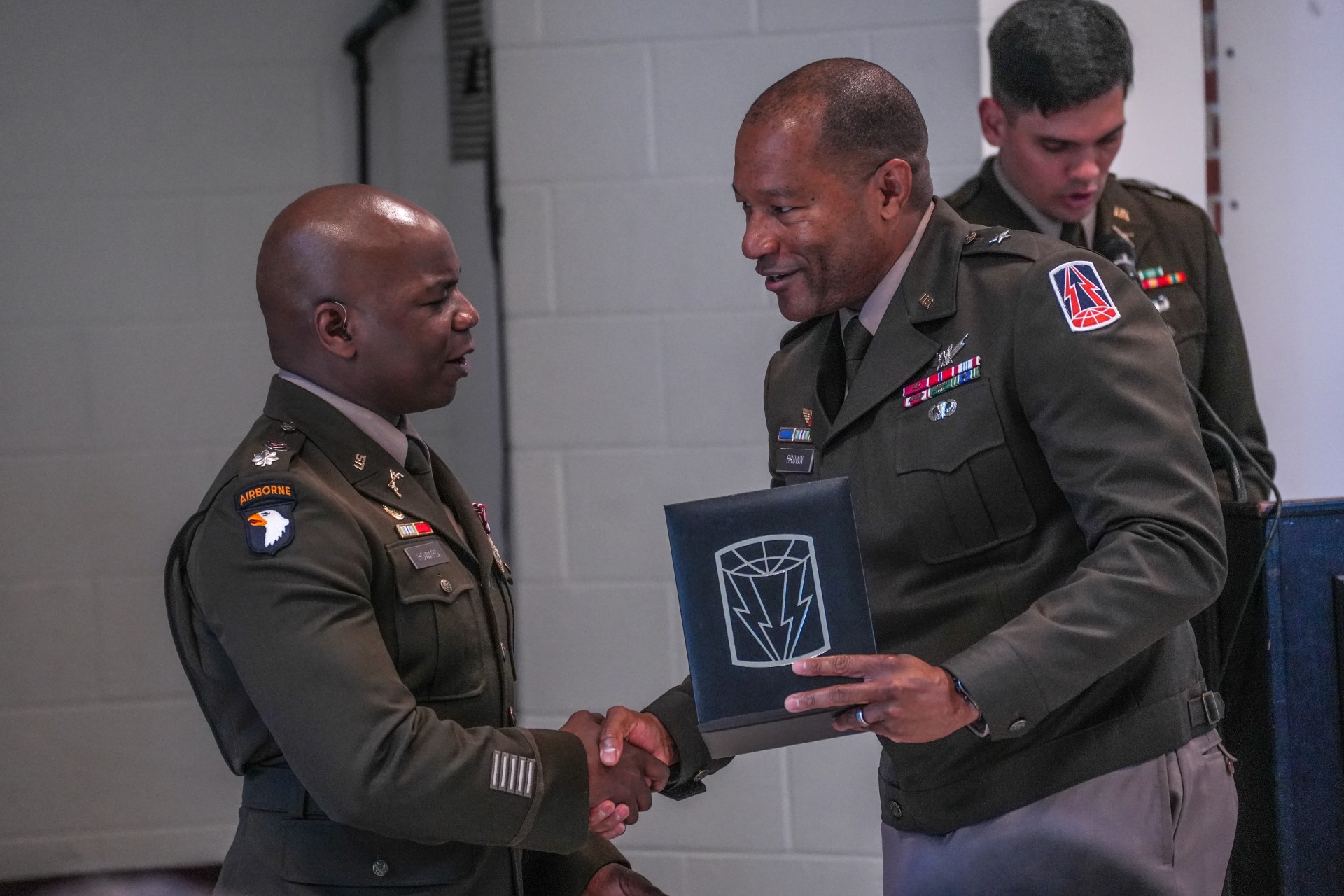 LTC Howard receives retirement honor from Brigadier General Tonri C. Brown