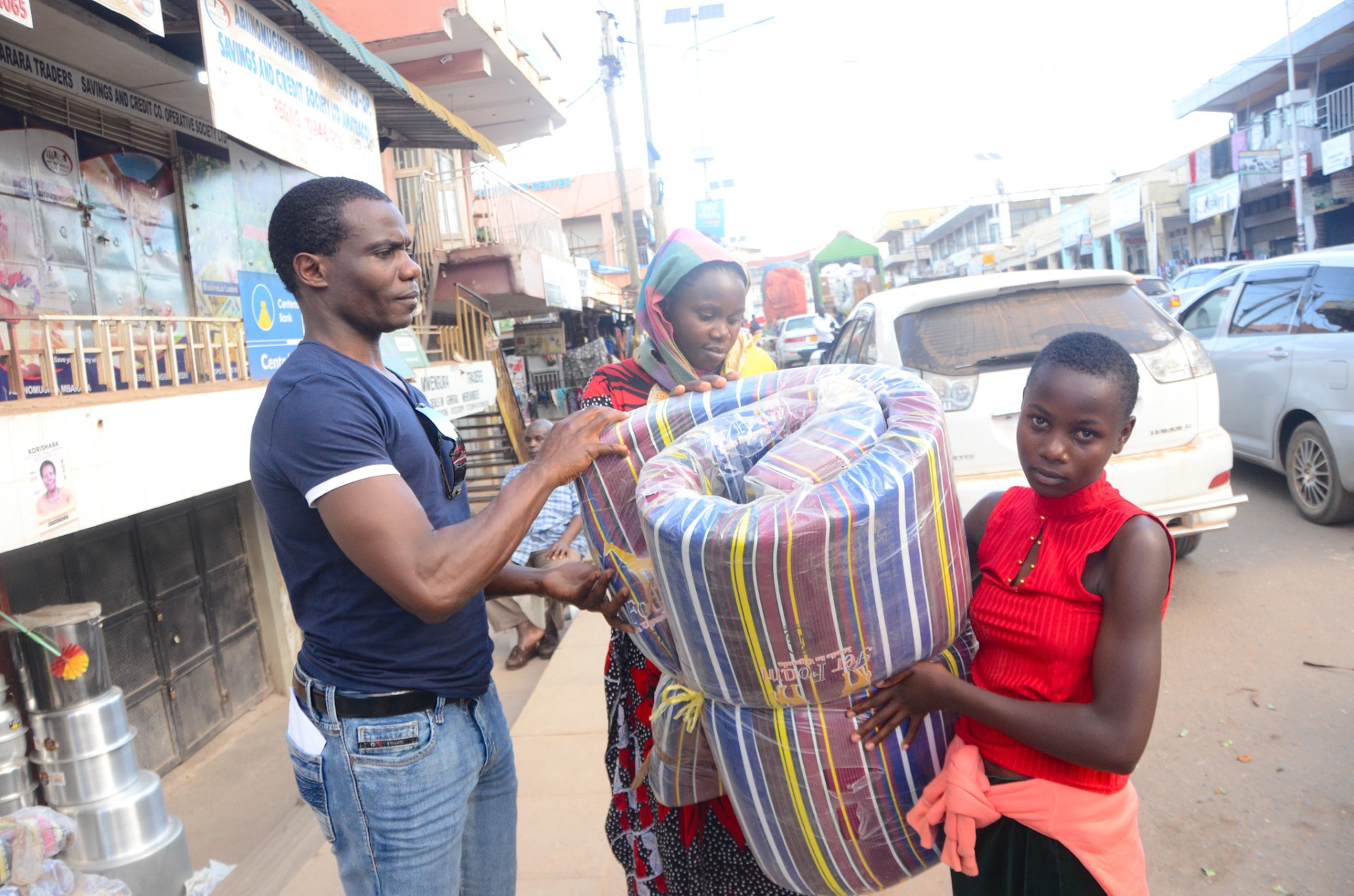 Dr. Twijukye, Annitah Akankwatsa and mother Annet Kenjobe shopping