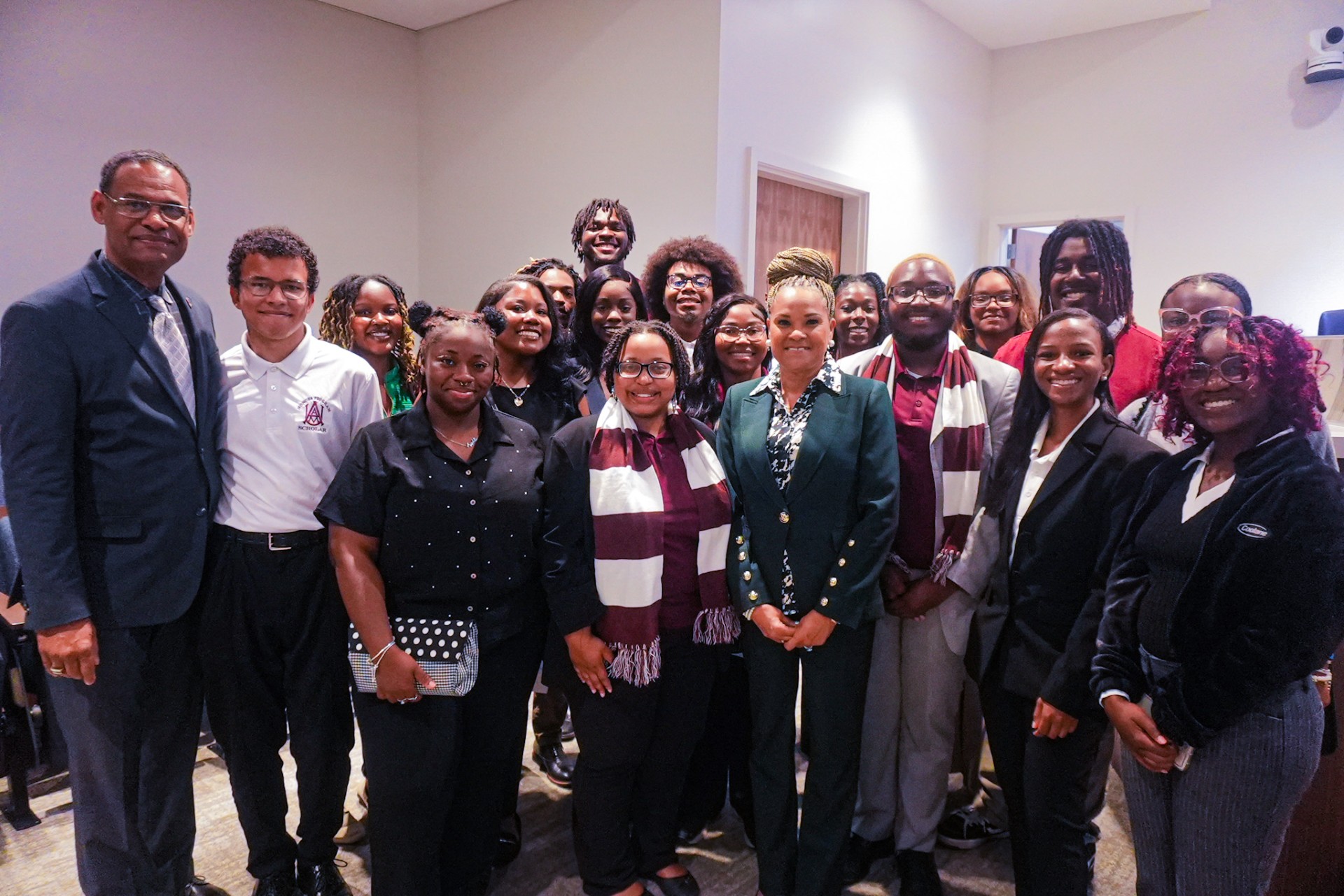 President Daniel K. Wims with Councilmember Watkins and A&M Students