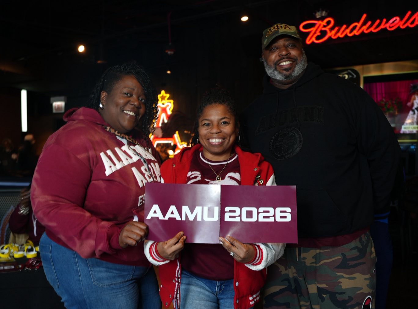 Three AAMU alumni smiling at HBCU Day Party at Brickhouse Tavern near Wrigley Field