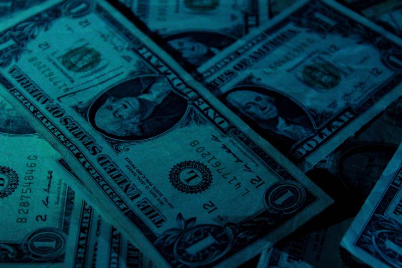 One dollar bills stacked