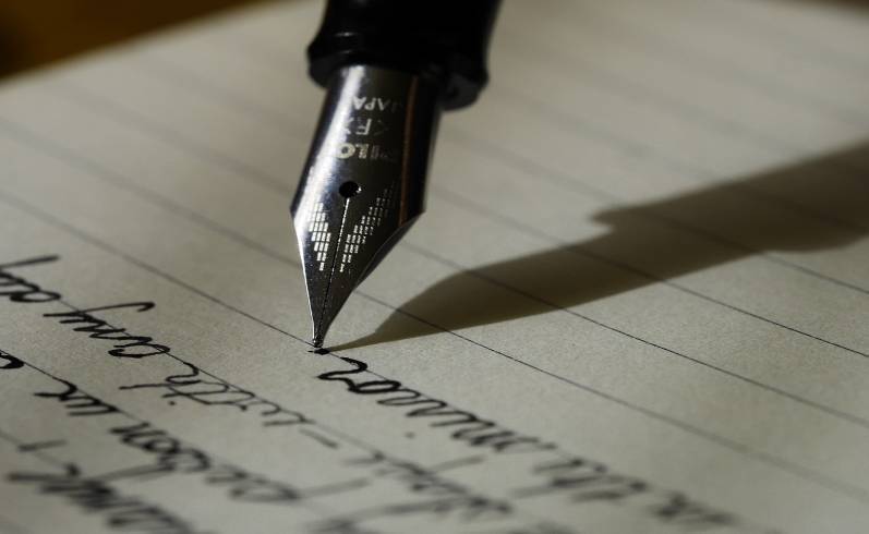 Calligraphy dip pen and paper