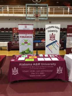 Accounting & Fianance Open House display with bannders behind table