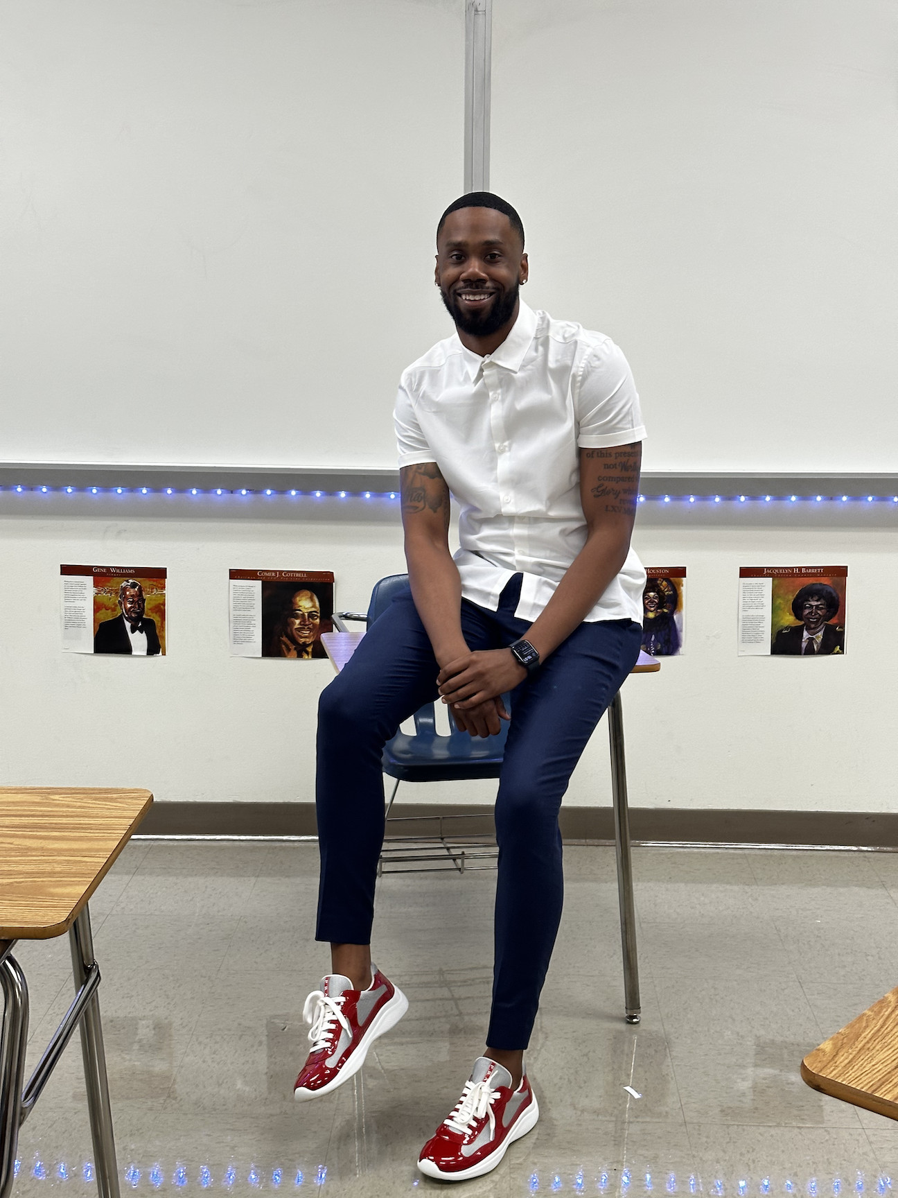 kris mccoy sitting on desk