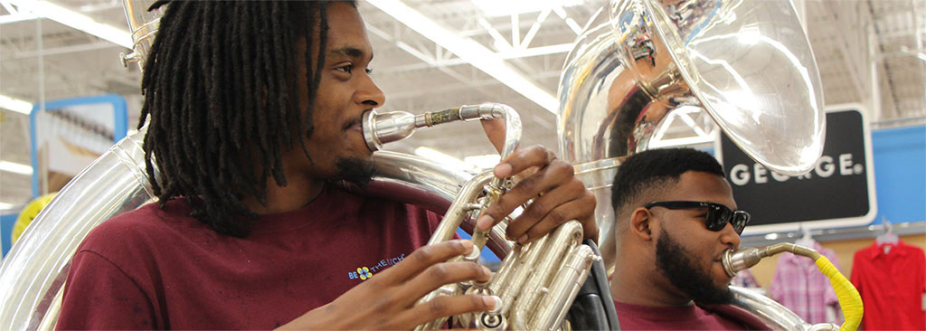 AAMU students play sousaphones at Wal-Mart during Wal-Mart's AAMU Day
