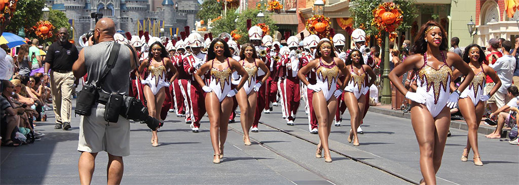 AAMU's Marching Maroon and White Band marches in a parade at DisneyWorld