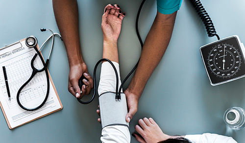 person getting blood pressure taken