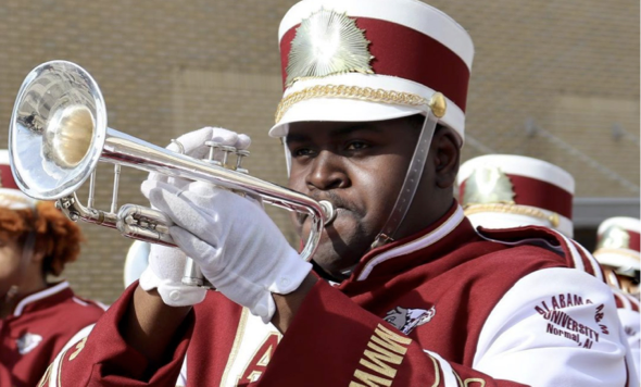 Student playing a trumpet.