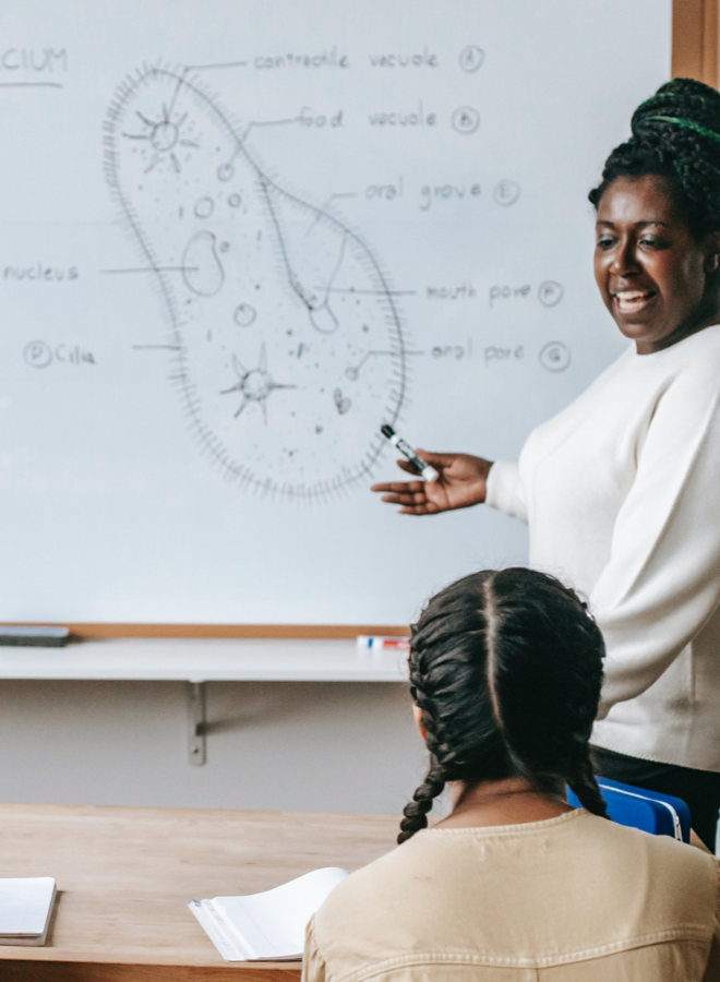 A teacher instructing in her science class